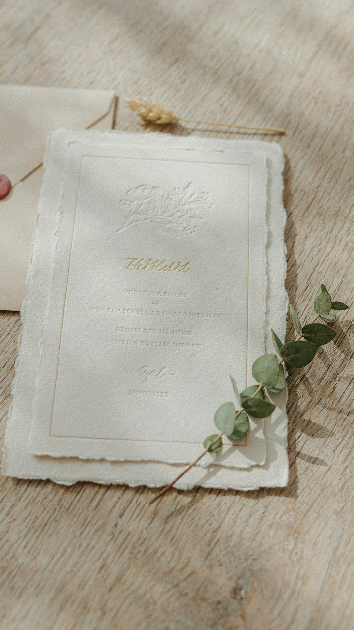 Close-up of a 'casual formal' wedding invitation card.