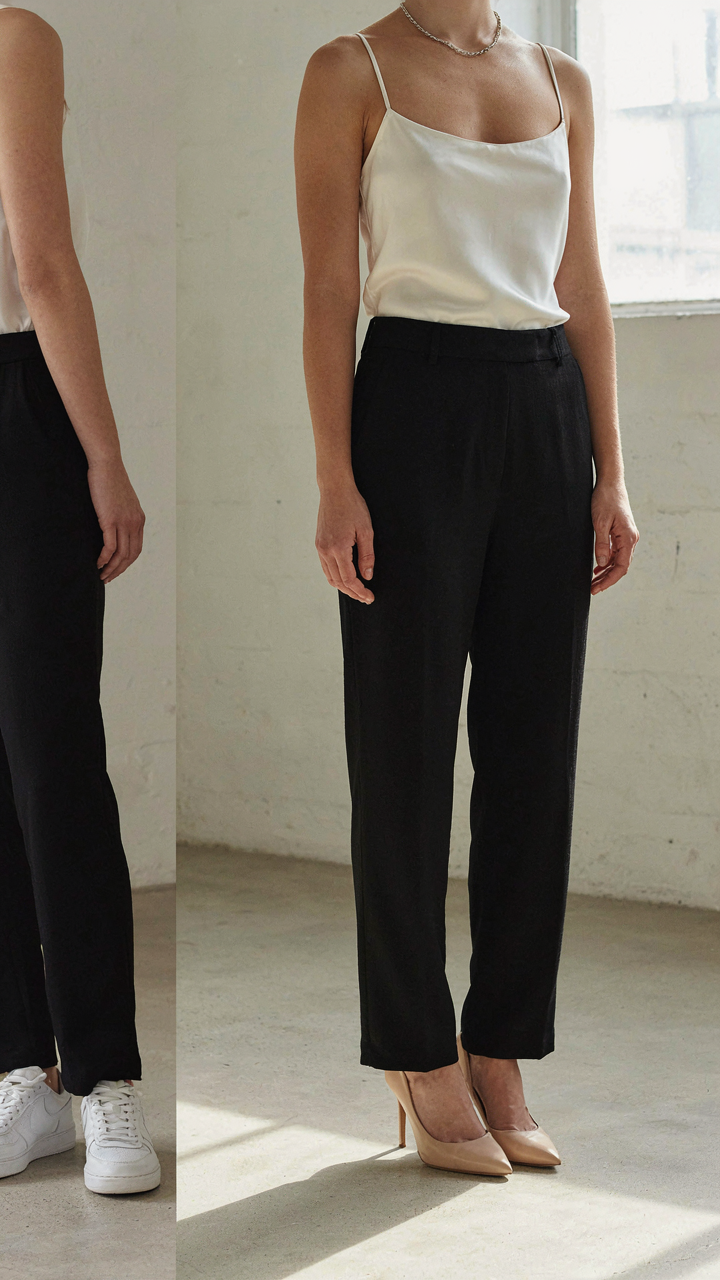 Black crepe trousers dressed up with pumps and down with sneakers.
