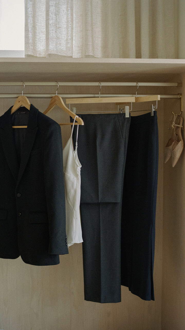 A wardrobe shows modular formal separates: blazer, camisole, trousers.