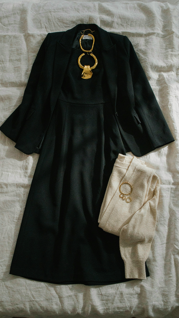 A black dress styled two ways with different accessories.