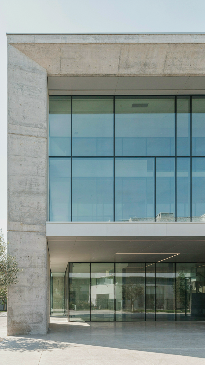 Modern building with clean lines and a visible, load-bearing support beam.